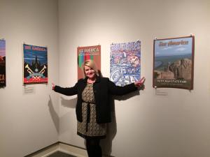 Showing my two posters displayed at the 