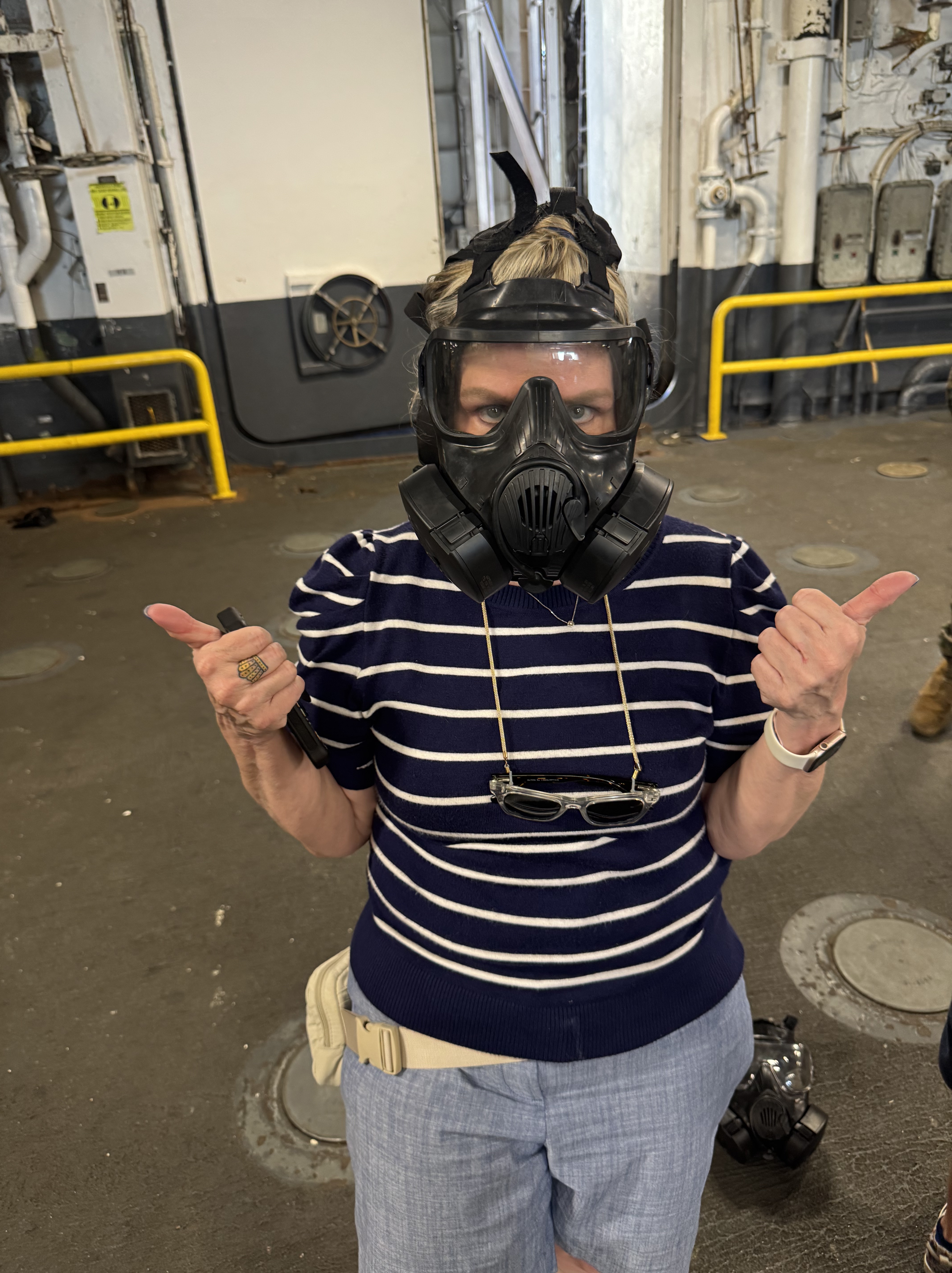 A woman wearing a gas mask