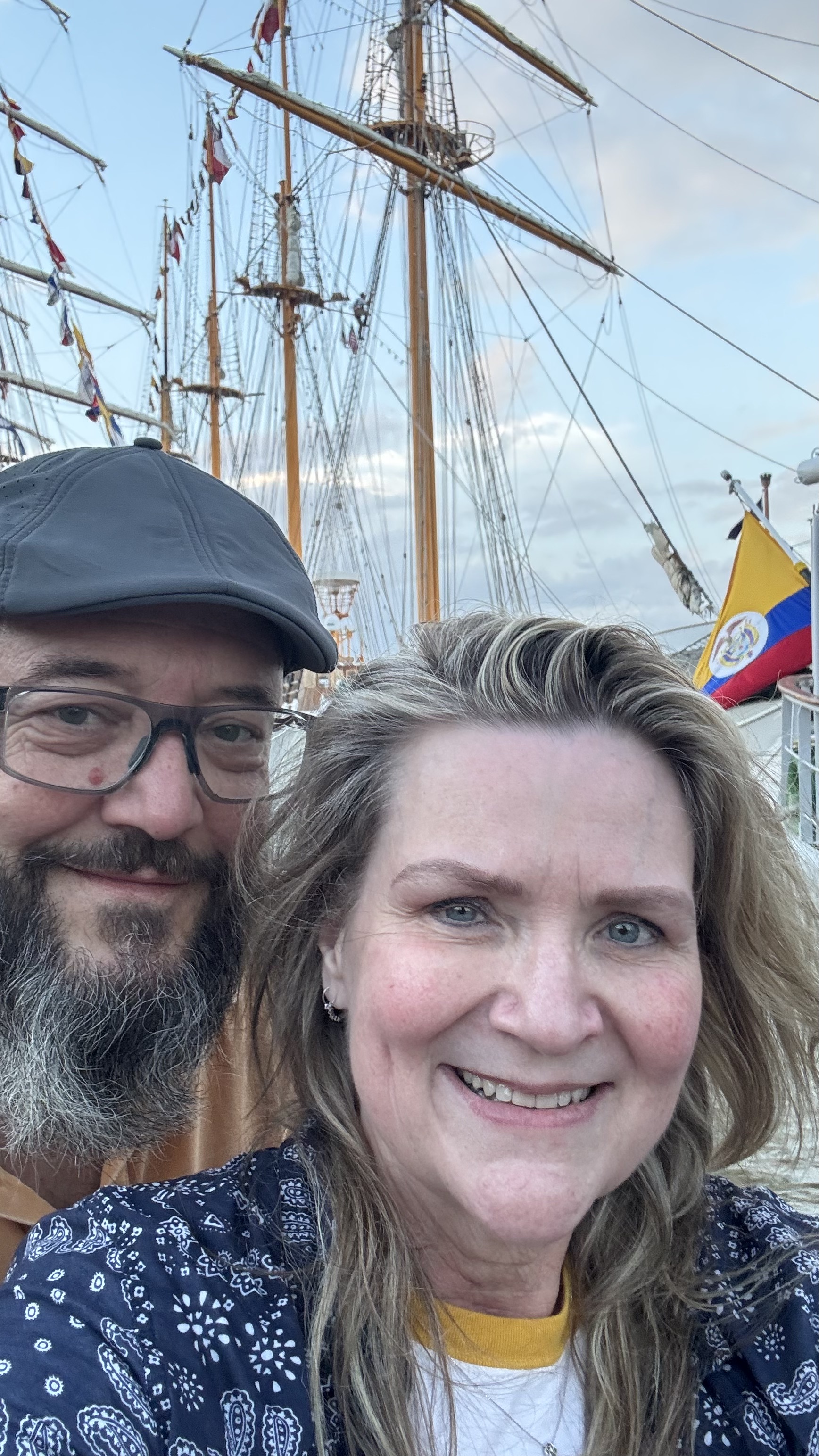 a man and woman standing in front of the B.A.P. Union - a Peruvian Tall Ship