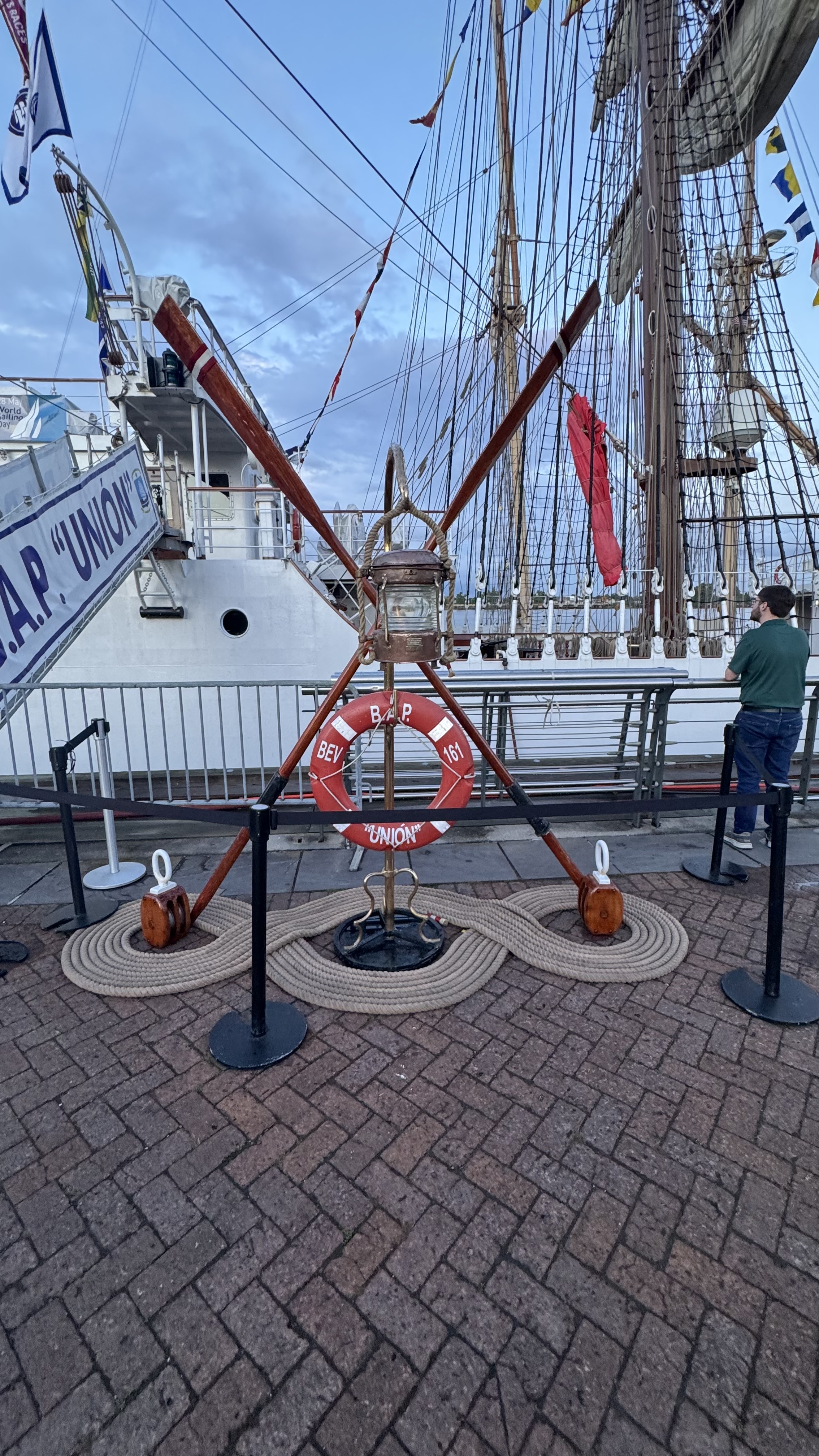 A rope and life raft display in front of the B.A.P. Union - a Peruvian Tall Ship