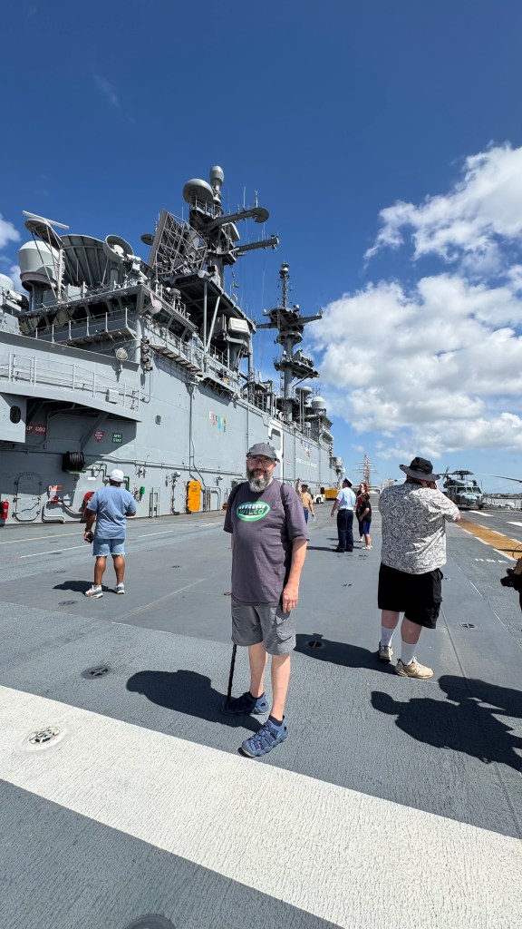 People touring the flight deck of the USS Kearsarge